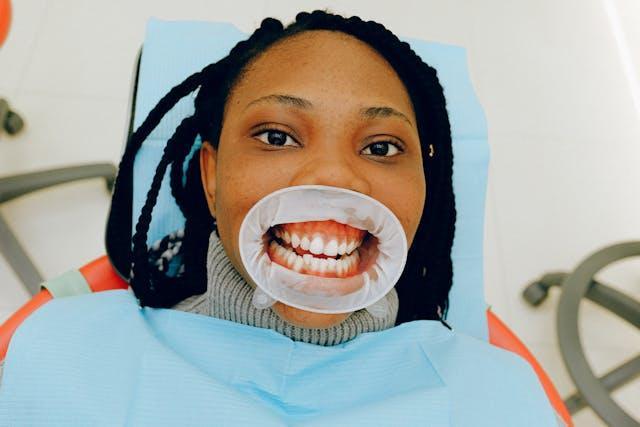 Patient receiving dental care at Happy Tooth Dental